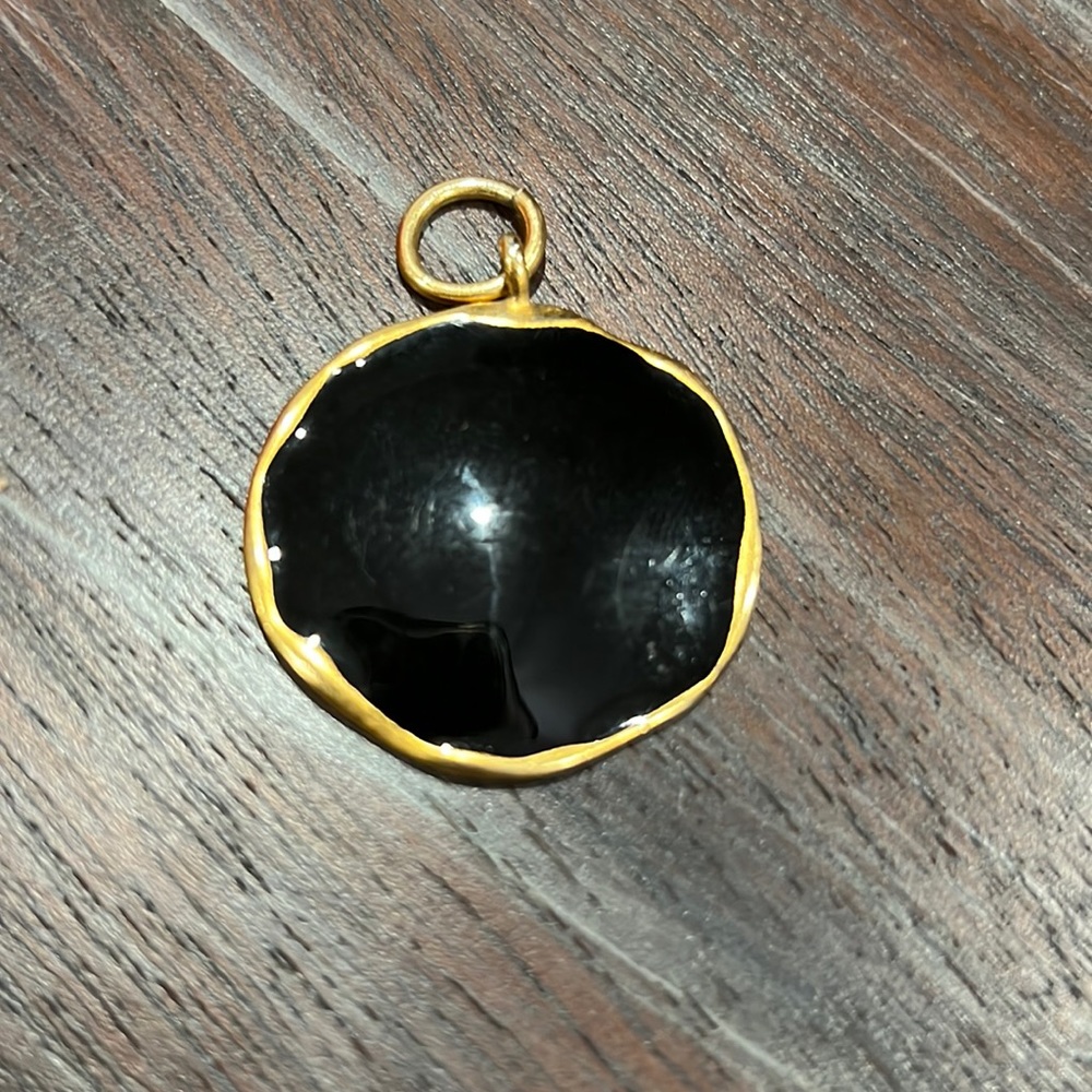 Vintage black enamel with gold plating pendant or charm.